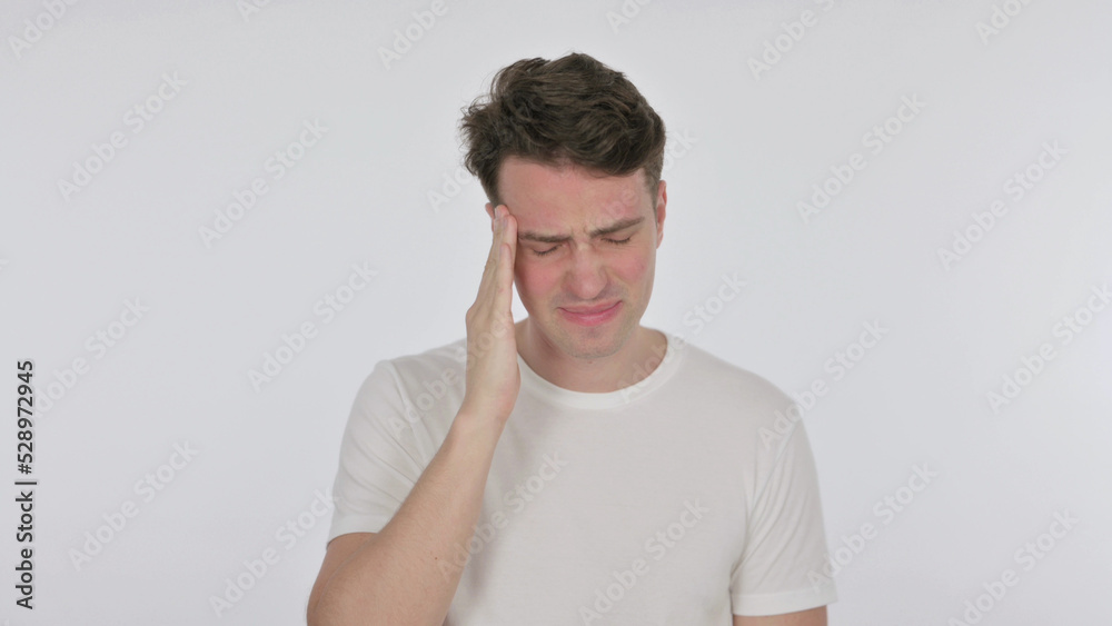 Obraz premium Young Man with Headache on White Background
