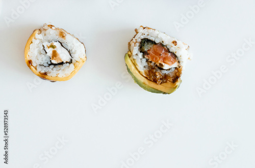 Sushi Rolls Set, maki, philadelphia and california rolls, on a white background.