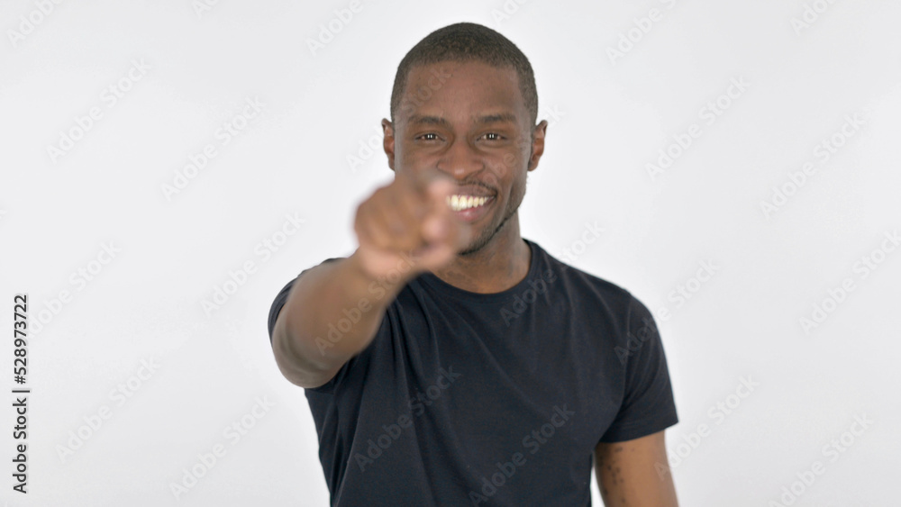 Young African Man Pointing at Camera on White Background Young African Man Pointing at Camera on White Background