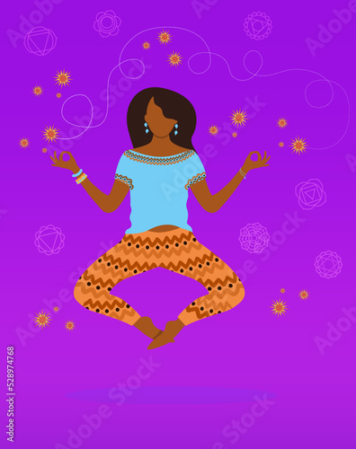 Young adult indian woman practicing yoga and meditation flying in air on background with chakras.