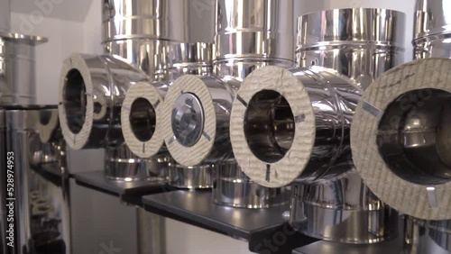 Wood stove installation. Installation of a metal chimney for a sauna