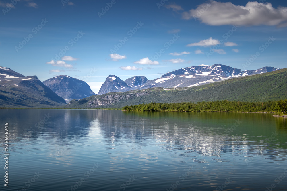 stunning mountain lake in Swedish Lapland, hiking the Kungsleden near Kebnekaise stunning mountain lake in Swedish Lapland, hiking the Kungsleden near Kebnekaise