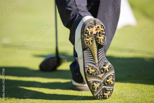 Club et chaussure de golf  photo