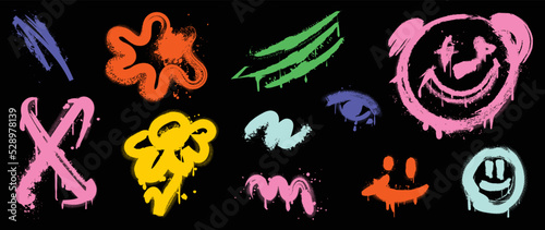 Set of graffiti spray pattern. Collection of colorful symbols, scribble, flowers, eye, smile, bear, stroke with spray texture. Elements on black background for banner, decoration, street art and ads.