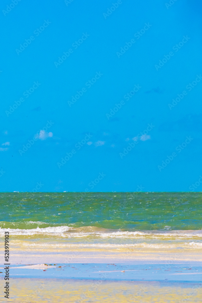 Beautiful Holbox island beach sandbank panorama turquoise water waves Mexico.