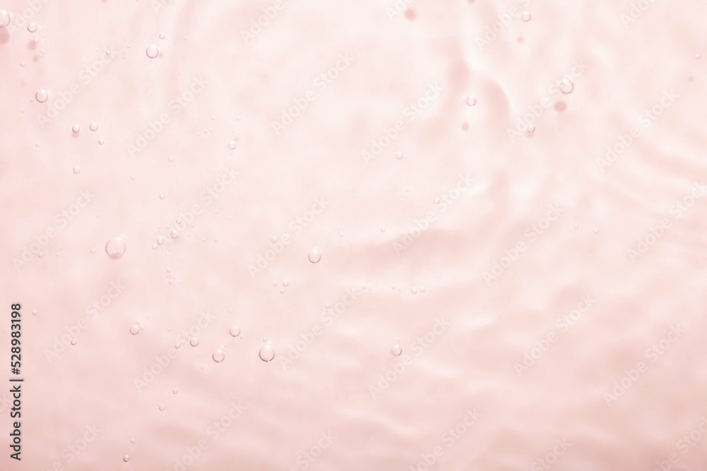 Fototapeta premium Cosmetic liquid texture. Tonic or toner texture, hyaluronic acid serum, flower water.