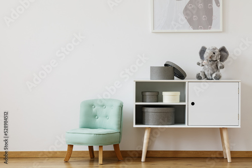 Cupboard and mint chair