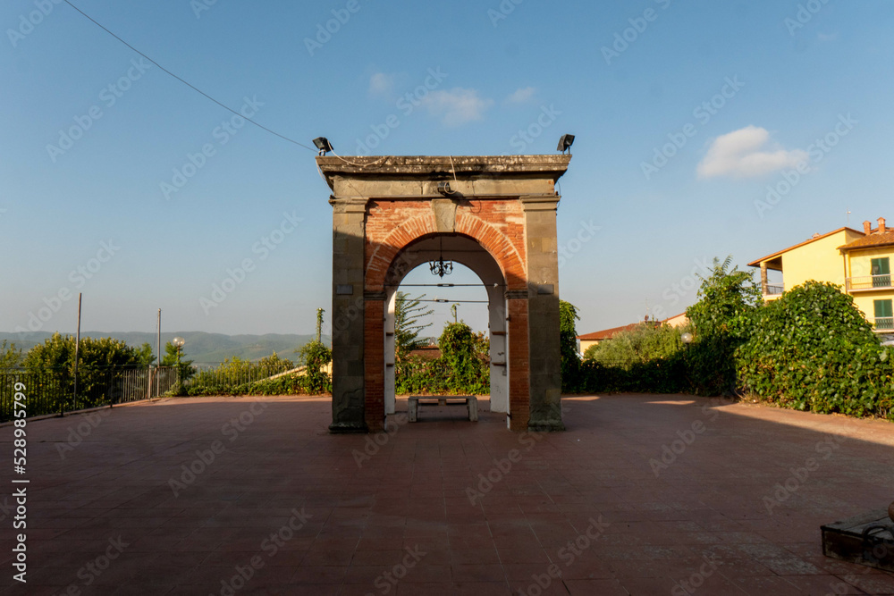 A quiet street of residential buildings in the historic medieval village of Panzano Tuscany A quiet street of residential buildings in the historic medieval village of Panzano Tuscany