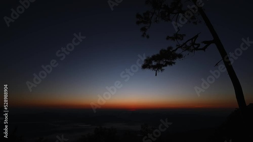 Beautiful sunrise with endless horizon on  Phukradueang national park loei city thailand.Phu Kradueng National Park is one of the best known national parks of Thailand.Timelapse vdo
 photo