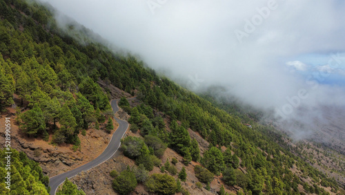 mountain road of El Hierro island with fog from drone