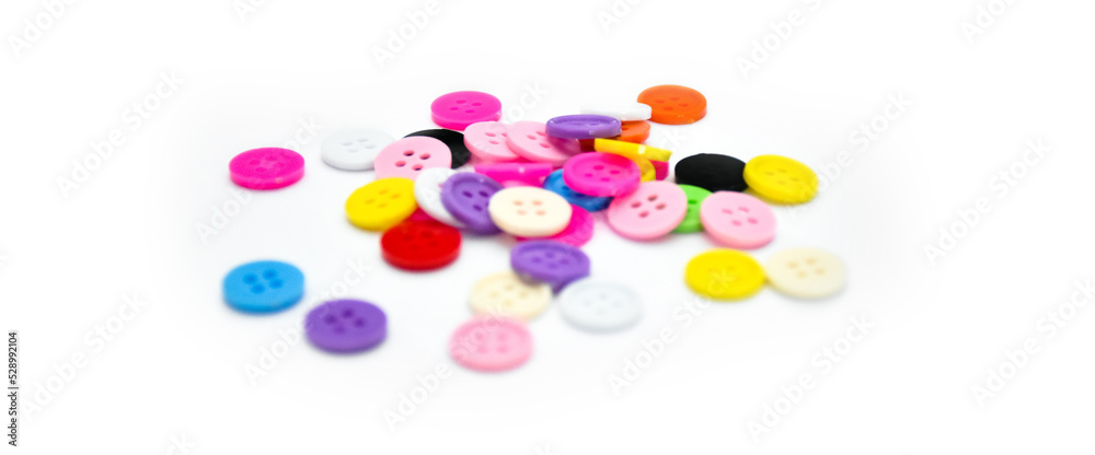 colorful various buttons on white background, soft and selective focus. colorful various buttons on white background, soft and selective focus.
