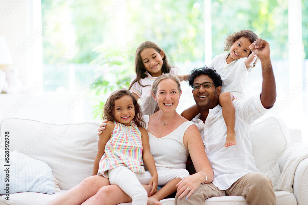 Beautiful family with kids at home