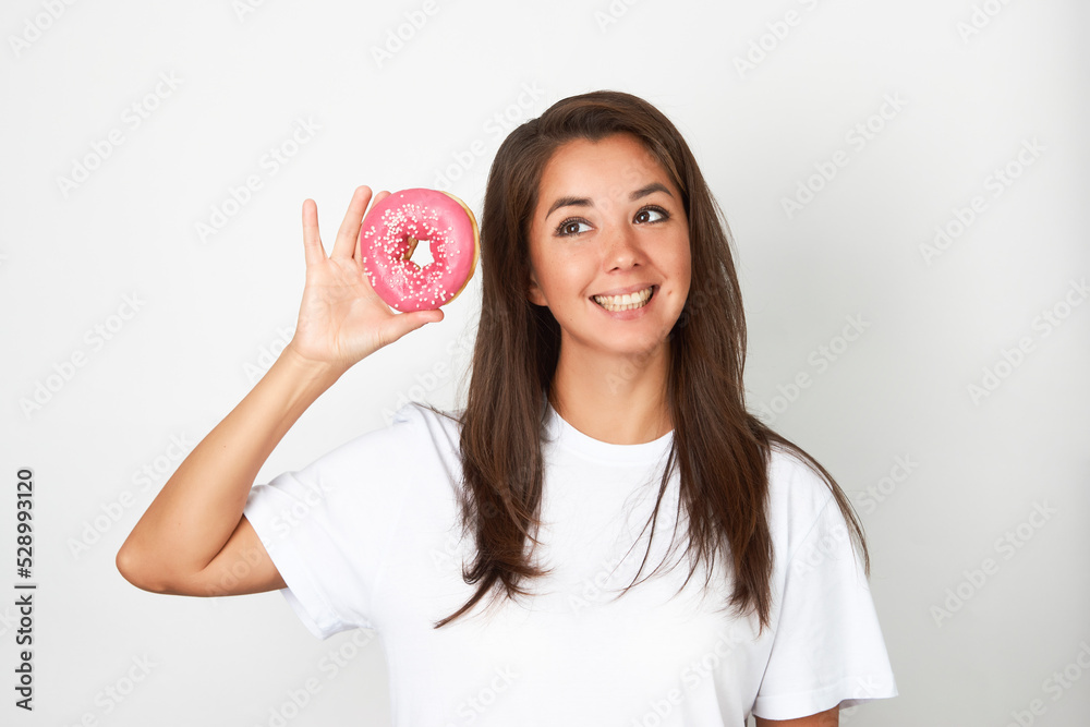 Woman with red donut on white background Woman with red donut on white background