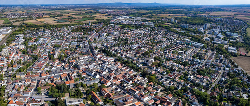 Aerial panorama view around the city Groß-Gerau in Germany on a sunny day in summer.