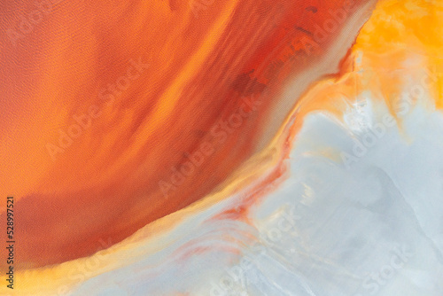 Colorful textures on sandy terrain at mine site in Huelva