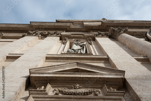 basilica of the jesuits and tomb of saint ignacius in rome street in ruins of the roman empire in rome, italy with ancient stones and texture photo
