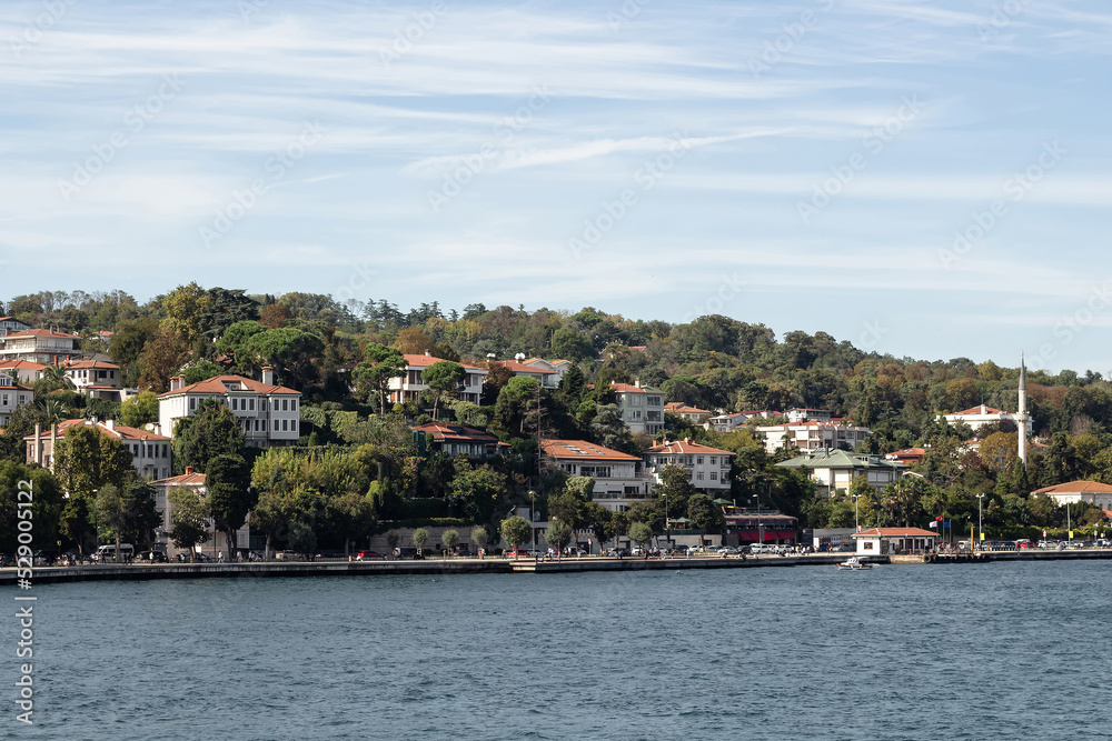 View of a neighborhood called Emirgan by Bosphorus on European side of Istanbul. It is a sunny summer day. Beautiful travel scene.