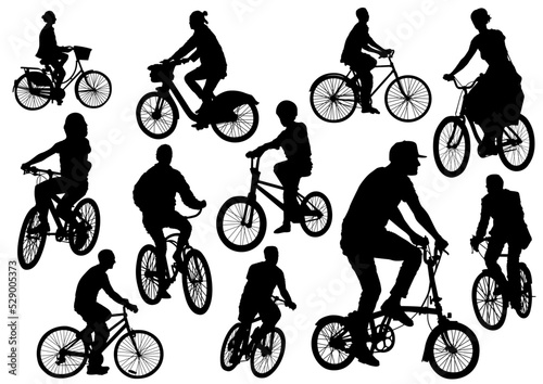 silhouette of a person riding a bicycle