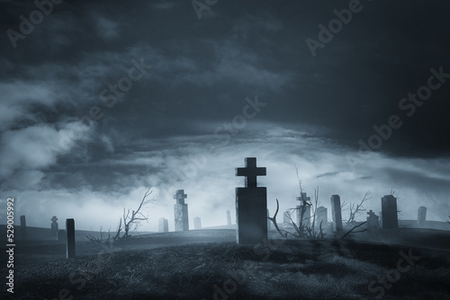 fog in dark graveyard at night