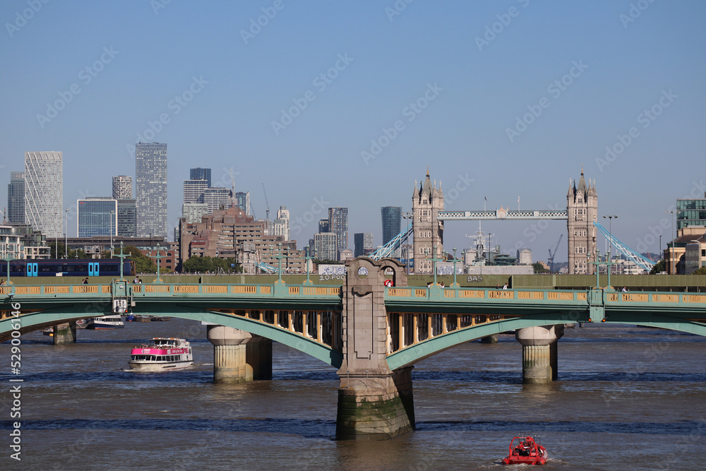Obraz premium London, United Kingdom - 11.08.2022: Southwark Bridge in London and the Famous Tower Bridge seen behind