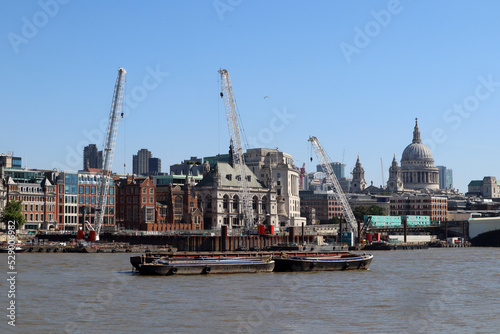 View of the City of London across the Thames on a sunny day