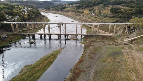 Puente de Portomarin con Rio Miño  photo