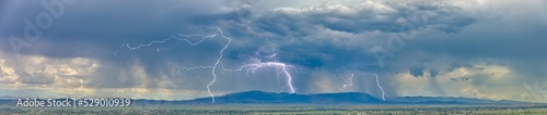 A massive monsoon storm over Mingus Mountain Arizona. This mountain is between the towns of Chino Valley and Jerome. photo