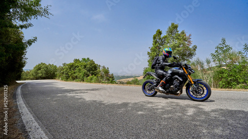 motorcycle on the road © ArtiFicio
