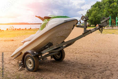 jet ski mounted on a special trailer on the beach