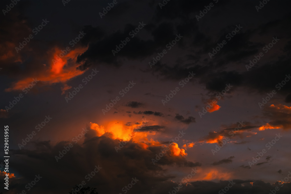 Fototapeta premium Powerful Dramatic Dark Red Sunset Sky Background