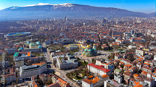 Aerial view of Sofia panoramic skyline in Bulgaria. Drone point of view of cityscape panorama ft St. Alexander Nevsky Cathedral, Sofia University St. Kliment Ohridski, Vasil Levski National Stadium 6K