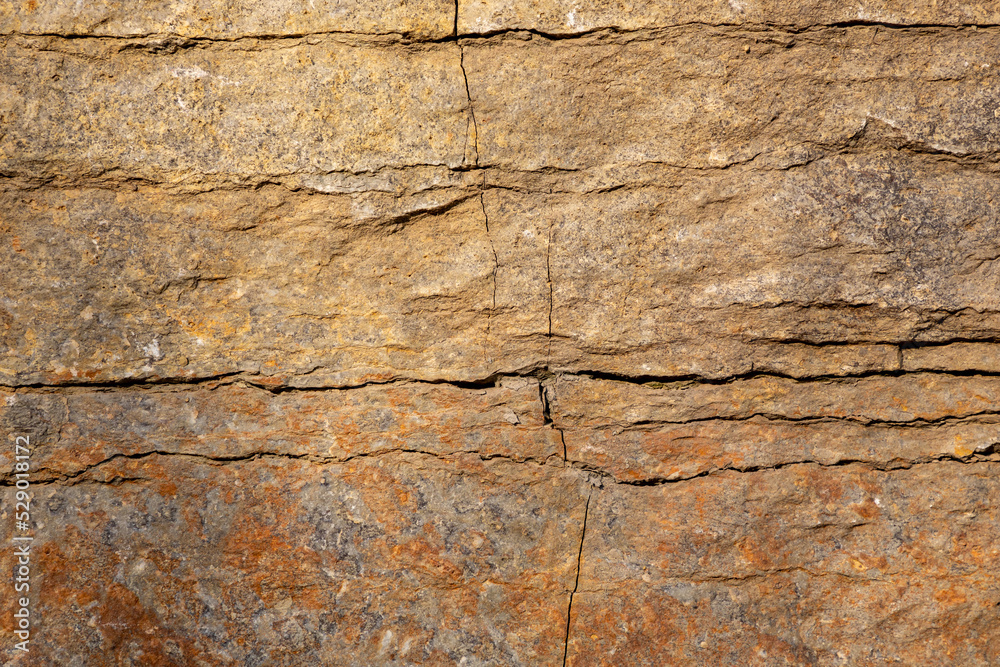 Stone texture detail, close up shot of rock surface for background and design. Stone texture detail, close up shot of rock surface for background and design.