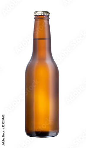 Brown glass bottle full of beer with cap isolated