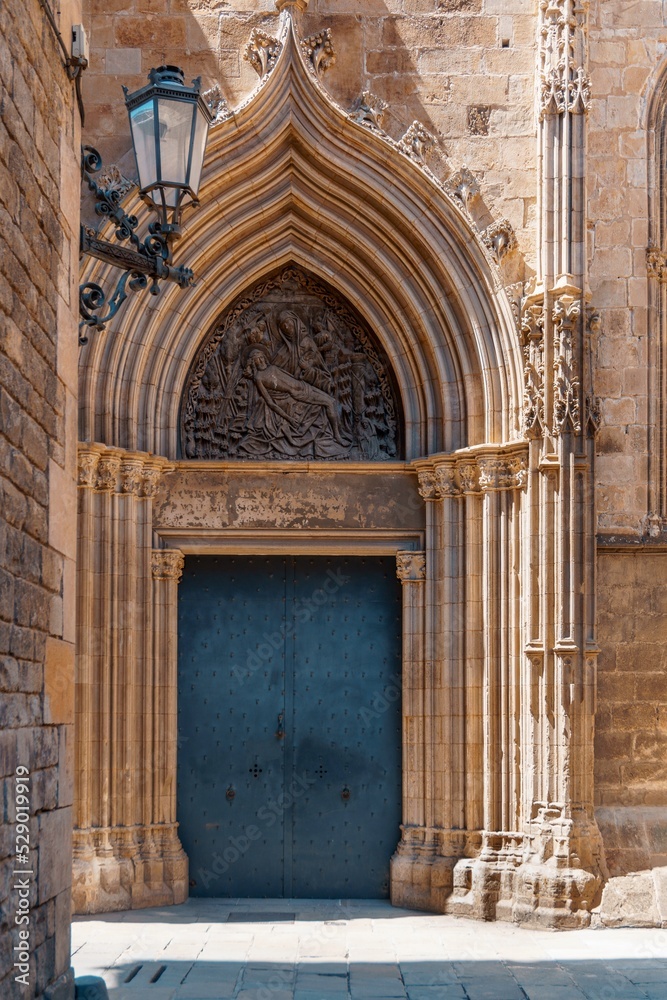 Door of mercy, Catedral de la Santa Creu i Santa Eulàlia Gothic cathedral of Barcelona, Spain was built during the 13th to 15th centuries on the same site where there was a Romanesque cathedral.
