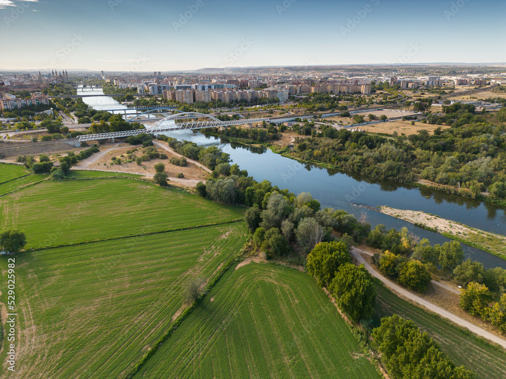 Aerial view of Ebro River,Railroad Bridge and Pilar Basilica