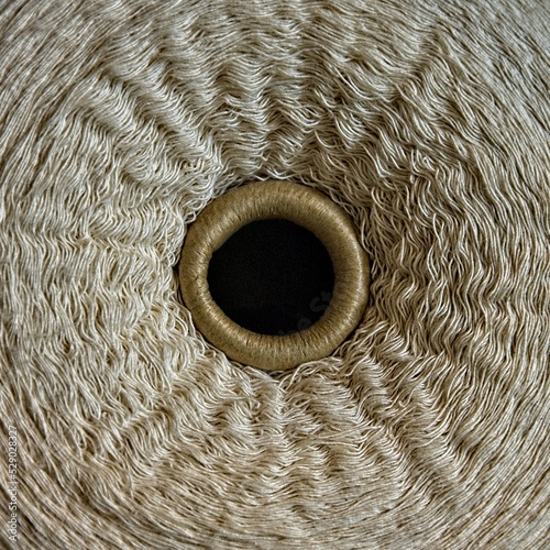 Close-up of spool of thread for weaving loom at Boott Cotton Mill at Lowell National Historical Park photo