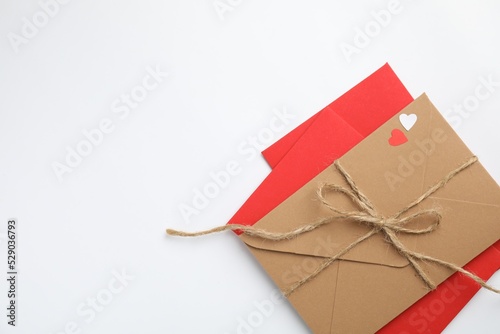 Envelopes on white background, top view with space for text. Love letters
