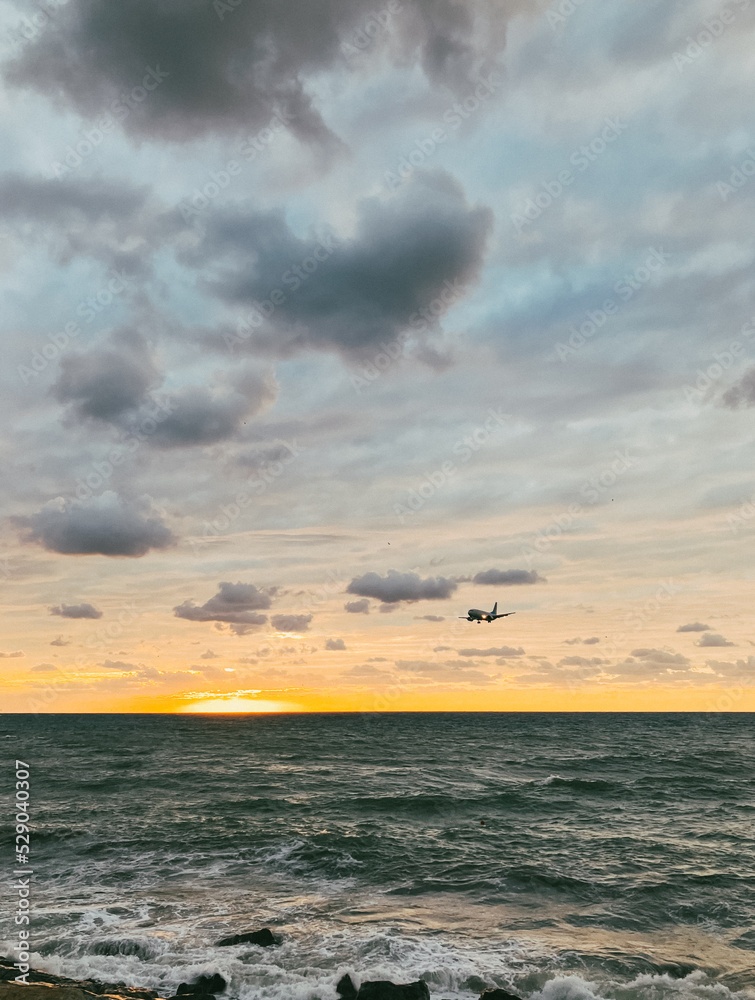 Naklejka premium Dramatic View of the Sunset on the Black Sea. Batumi Beach Adjara Georgia