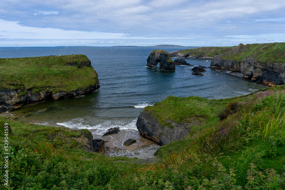 landscape of the Ballybunion Cliff Walk and rugged cliffs and seashore in County Kerry