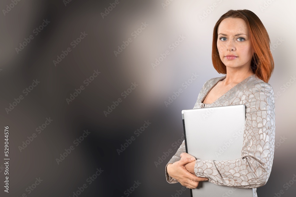 Fototapeta premium Portrait of attractive trendy cheerful skilled girl using laptop computer