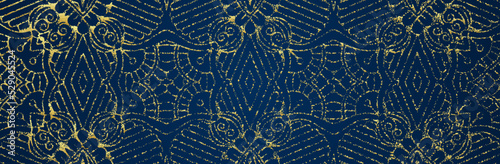 Banner, cover design. Ethnic vintage gold pattern on a blue background, boho style. Tribal traditional ornaments of East, Asia, India, Mexico, Aztecs, Peru.