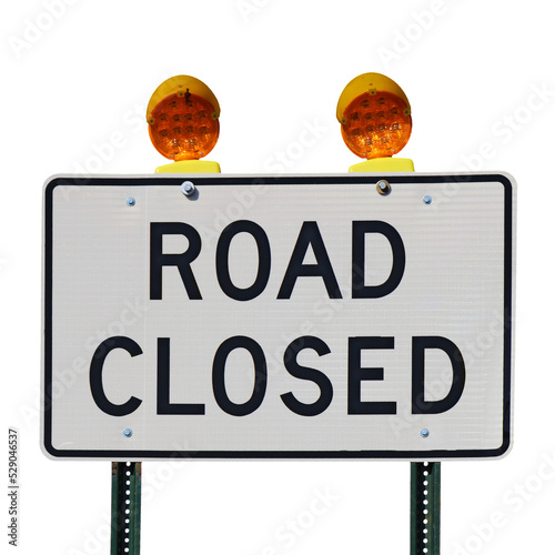 Road closed sign with orange lights isolated