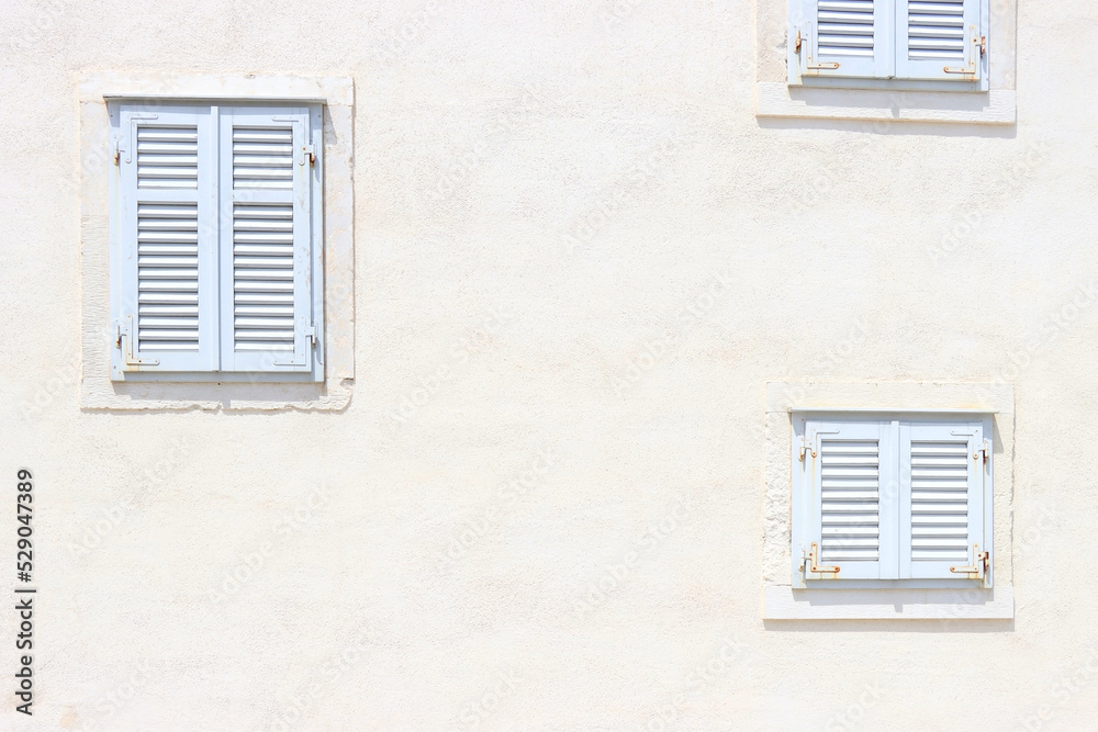 Traditional Mediterranean window in white on white background. Traditional Mediterranean window in white on white background.