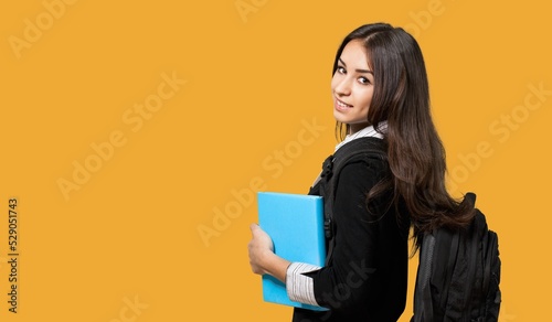 Smiling young girl student. Education in high school university college concept.