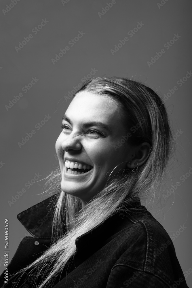 Portrait of young happy woman, poses on white wall. Mind set concept. Mock-up