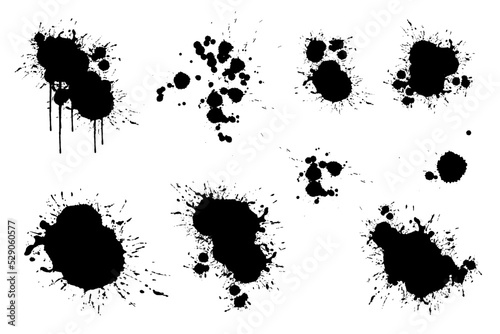 Set of abstract blots, spots and streaks with splashes.Vector graphics.