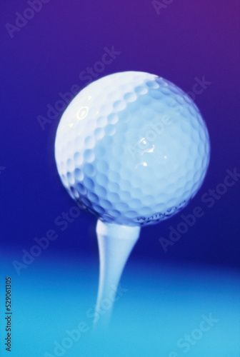 Close-up of a golf ball on a tee