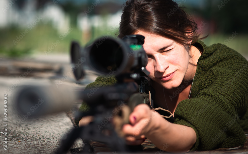 female sniper with a sniper rifle female sniper with a sniper rifle