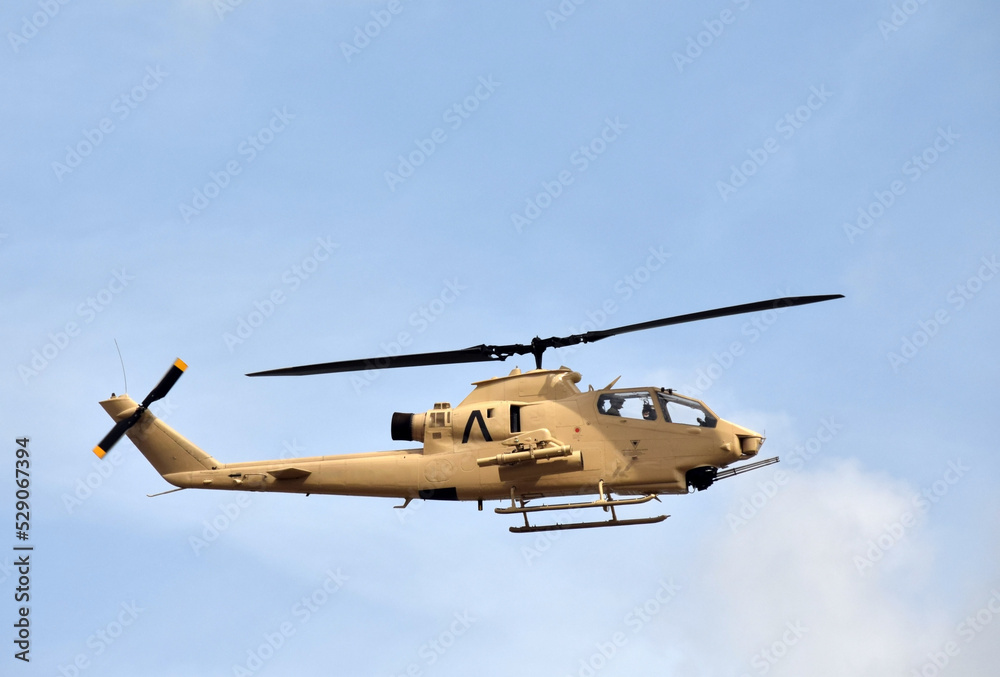 Fototapeta premium Vietnam War era helicopter in flight