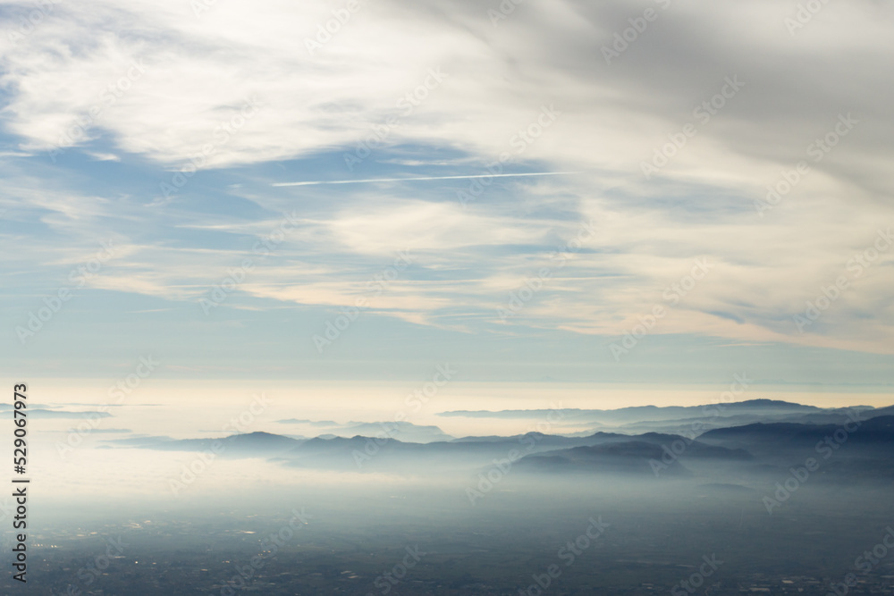 Sky with clouds over foggy plain Sky with clouds over foggy plain
